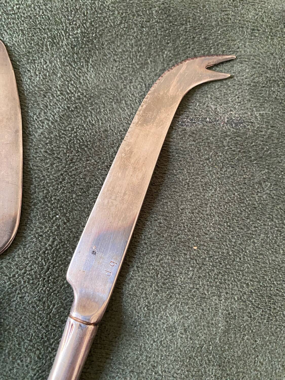 Cheese cutlery with silver-plated bamboo handle.