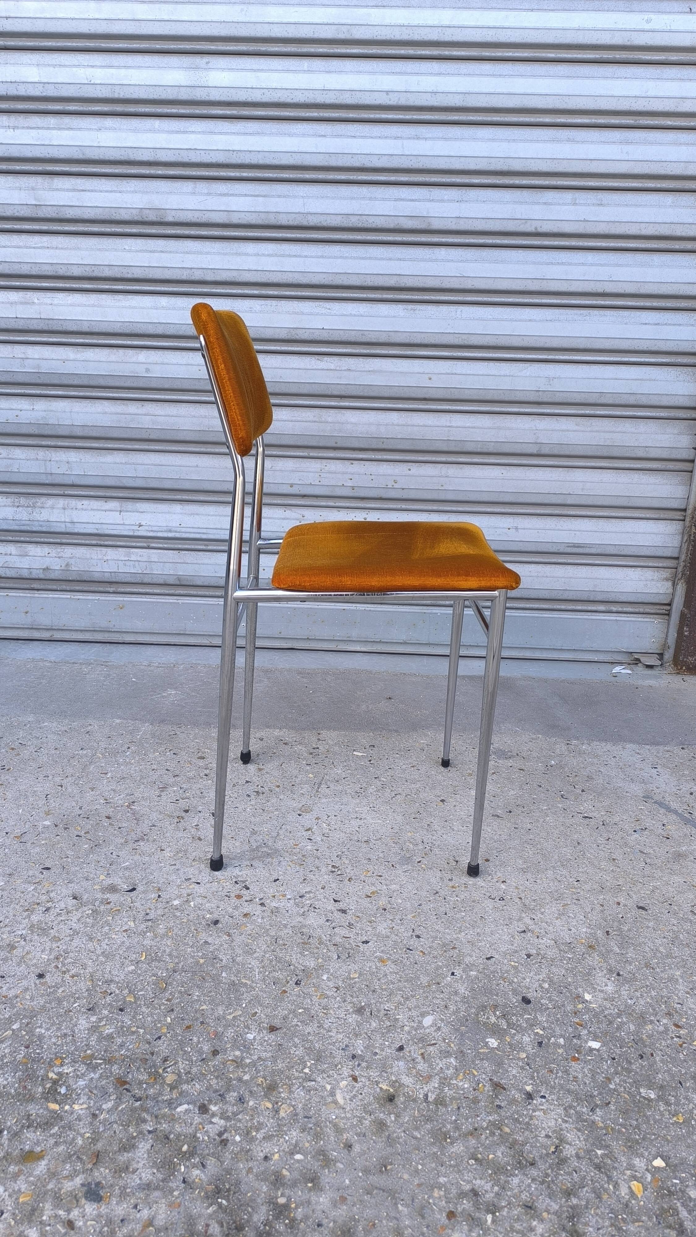 Chrome tubular chair with orange velvet, 1970s