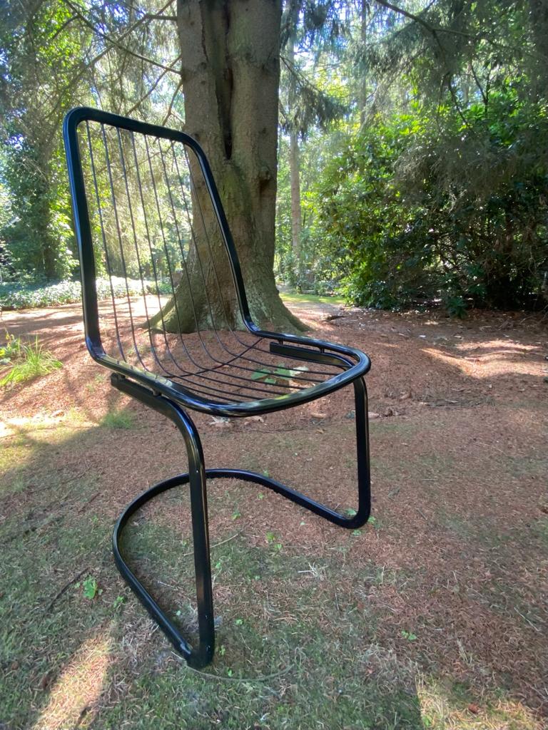 Set of four black highback dining chairs,  1970s