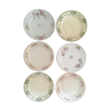Flat old plates mismatched with flowers