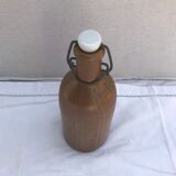 Bouteille grès brun avec bouchon porcelaine blanc vintage