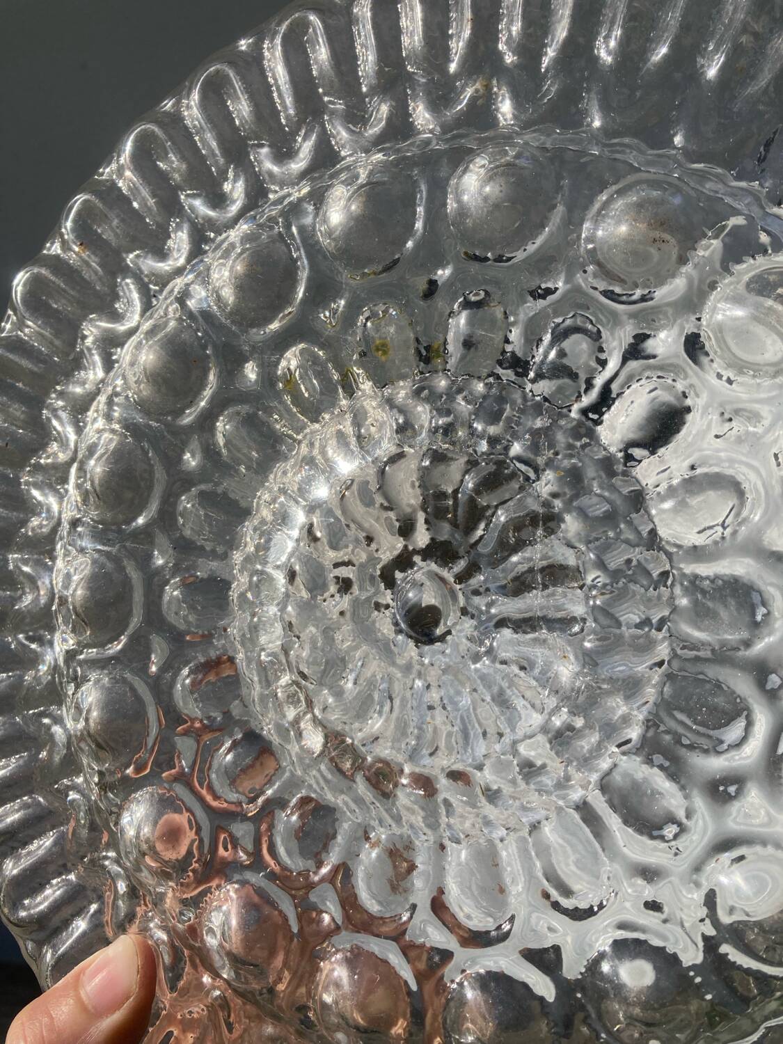 Pair of transparent round glass wall lights