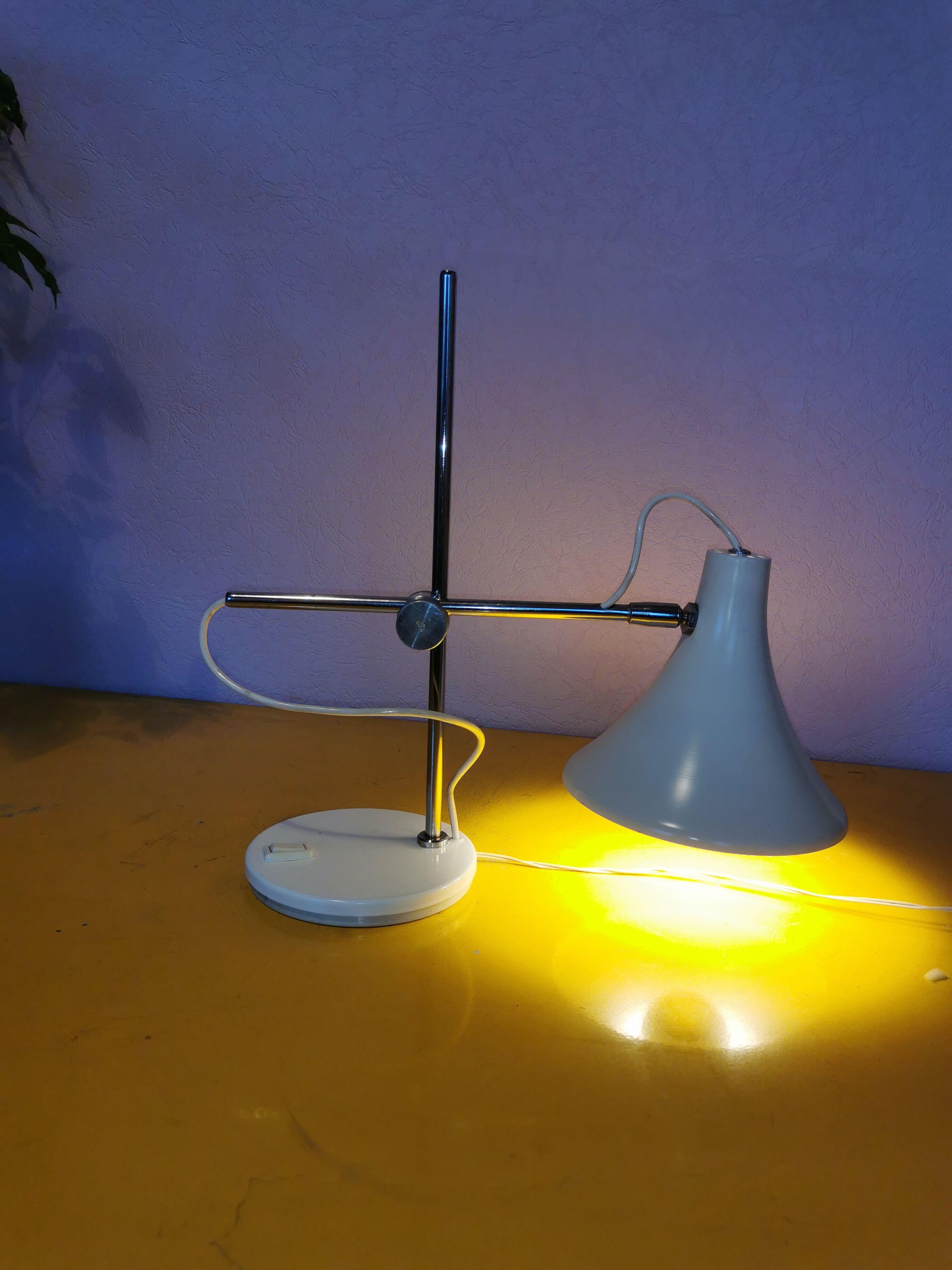 Articulated lamp in white lacquered steel and chrome, 1970.