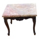 Carved wooden coffee table with shell pattern and removable pink marble top, old