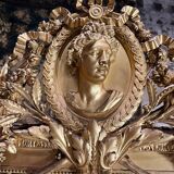 Monumental mirror Napoleon III in gilded wood with the profile of Apollo
