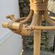 Vintage 1970s rattan parrot coat rack