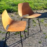 Pair of tonneau chairs by Pierre Guariche plywood base tubes 1954
