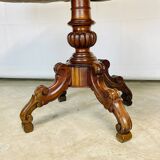 Violin-shaped pedestal table