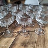 Set of 12 vintage glass champagne glasses with curved foot