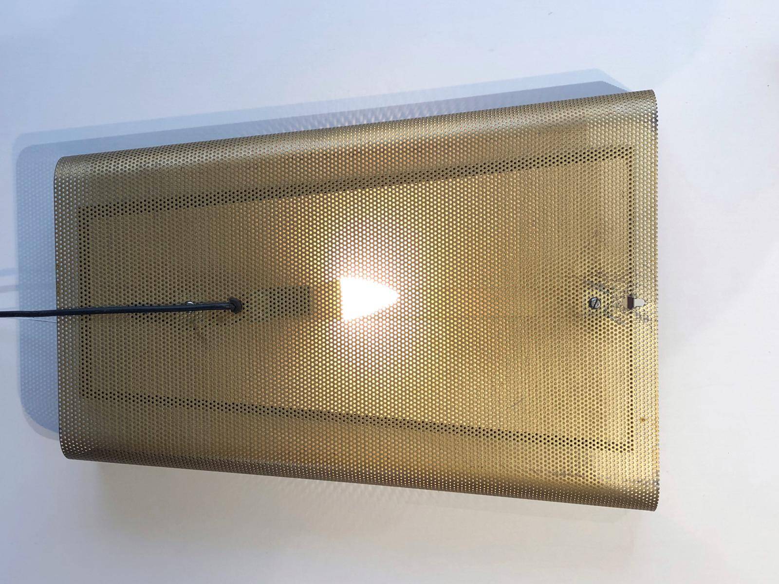 Backlit wall mirror by Floris H. Fidelij