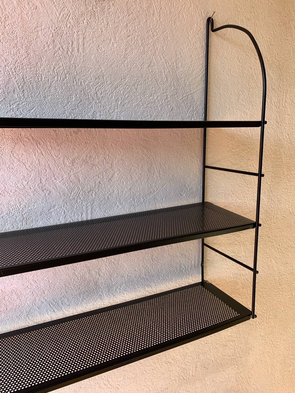 Black metal string shelf