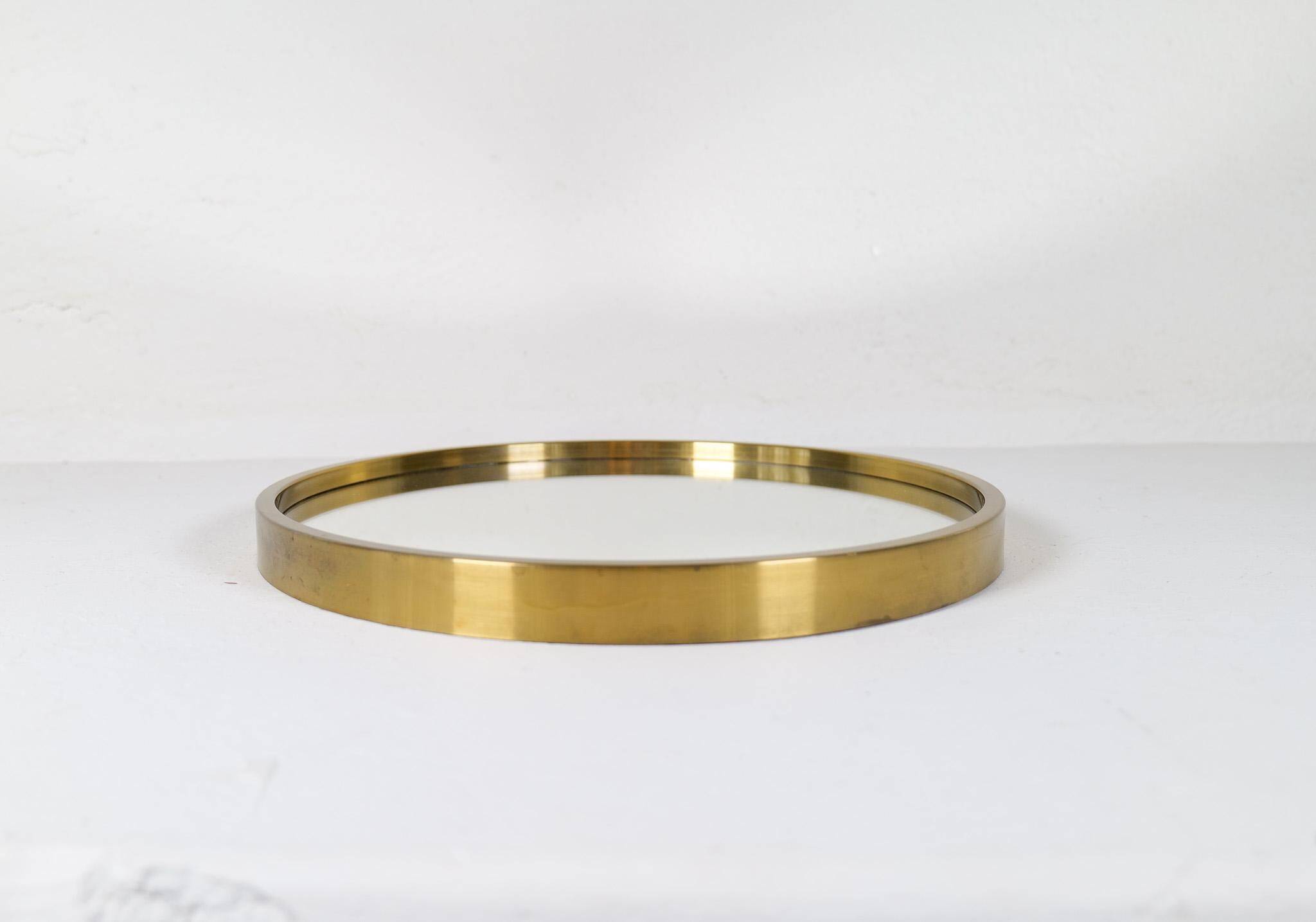 Round brass mirror from the mid-century by Glasmäster in Markaryd, Sweden, 1960s.