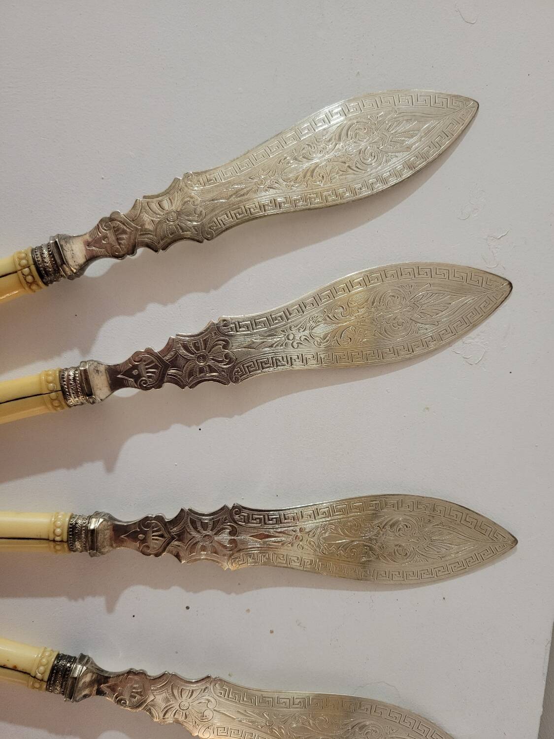 English fish knives in silver and ivory, 19th century