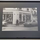 Vintage silver gelatin print of a street scene in a shop window, 1970s, framed, 52 x 42 cm