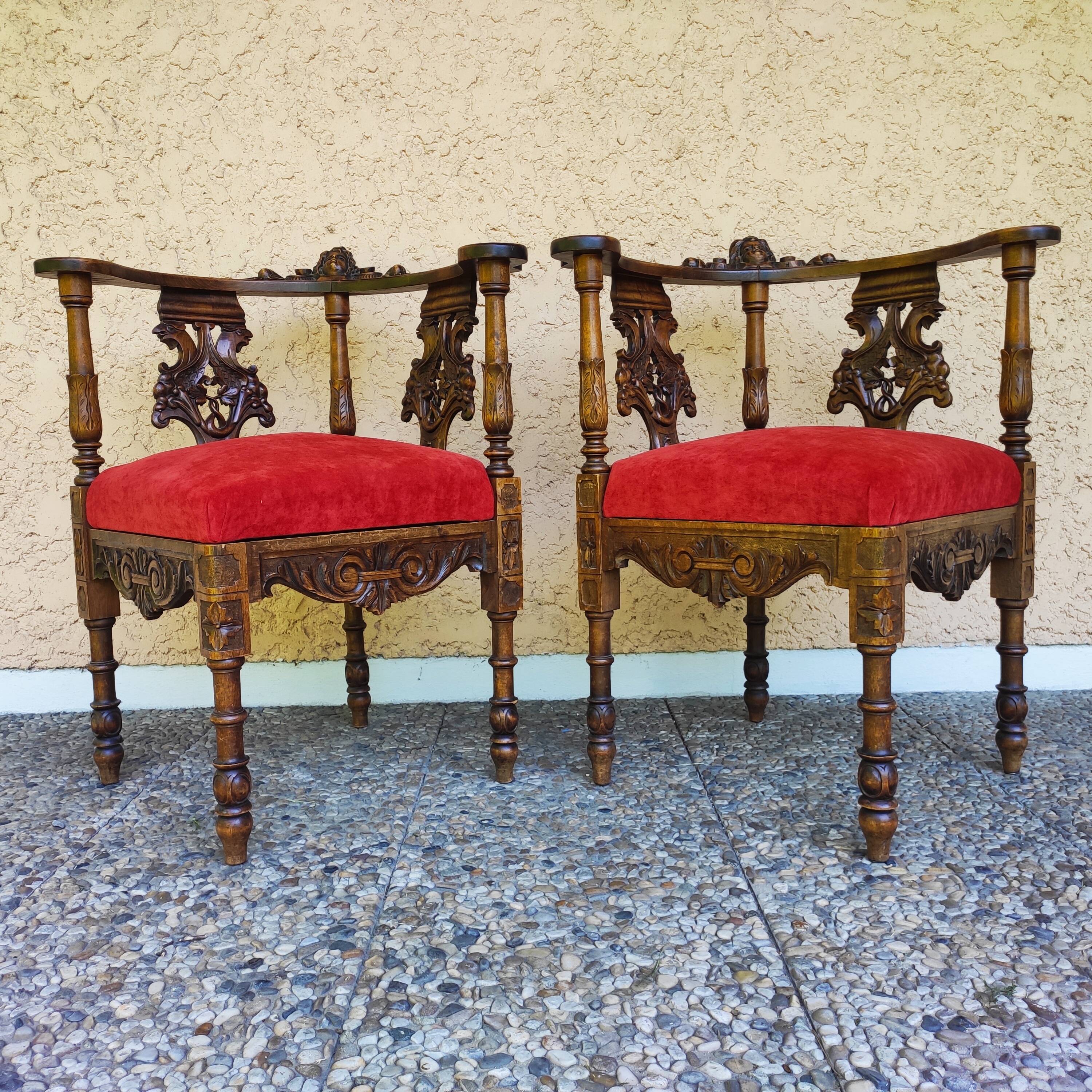 Pair of neo-Renaissance Henri II corner armchairs in carved wood, 19th century.