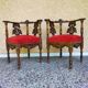 Pair of neo-Renaissance Henri II corner armchairs in carved wood, 19th century.