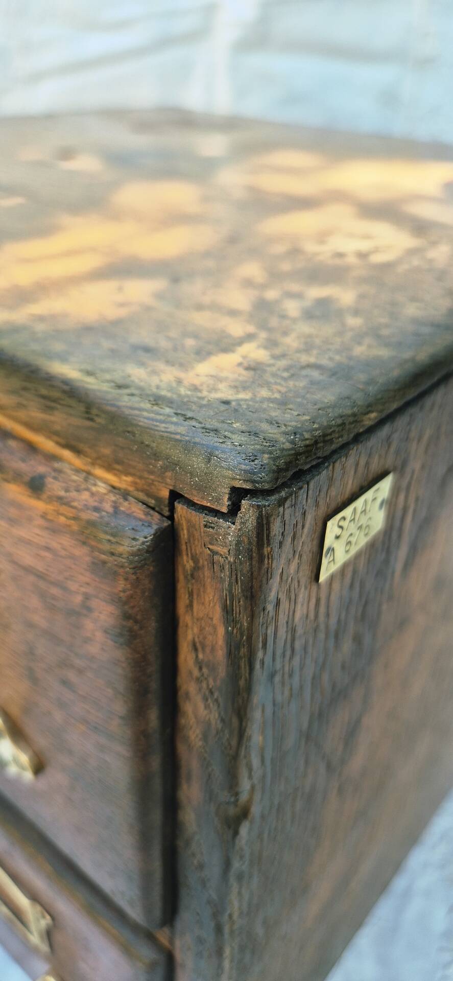 Workshop furniture made of oak and brass.