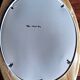 Large oval mirror in vintage white enamelled cast iron