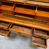 Cylinder desk with marquetry featuring a crosshatch design.