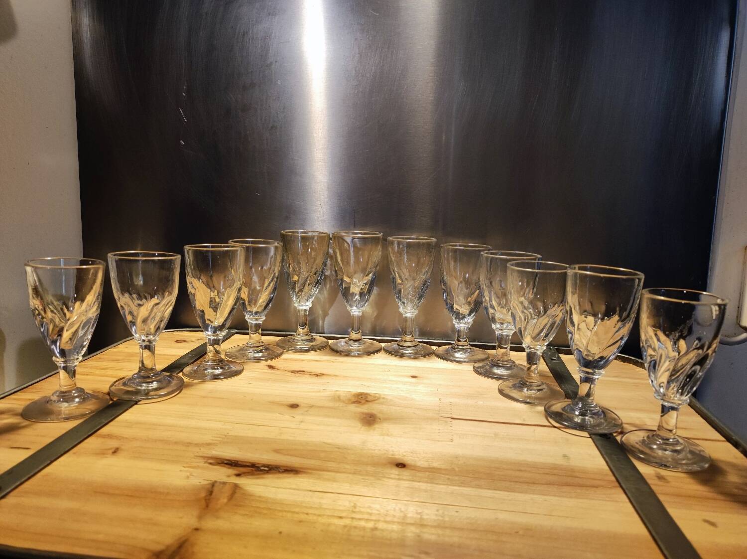 12 small twisted bistro glasses, 19th century