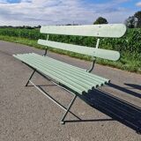Old wrought iron folding bench
