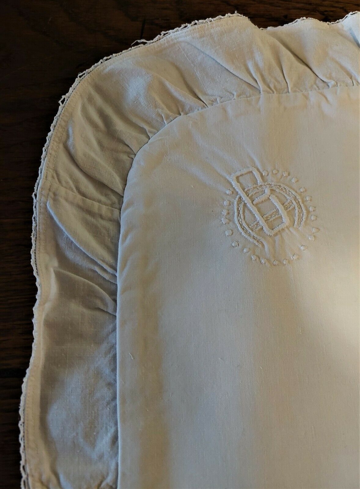 White cotton cushion or pillow case embroidered monogram and ruffle
