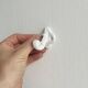 Bathroom décor, hooks, soap dish, white metal hangers.