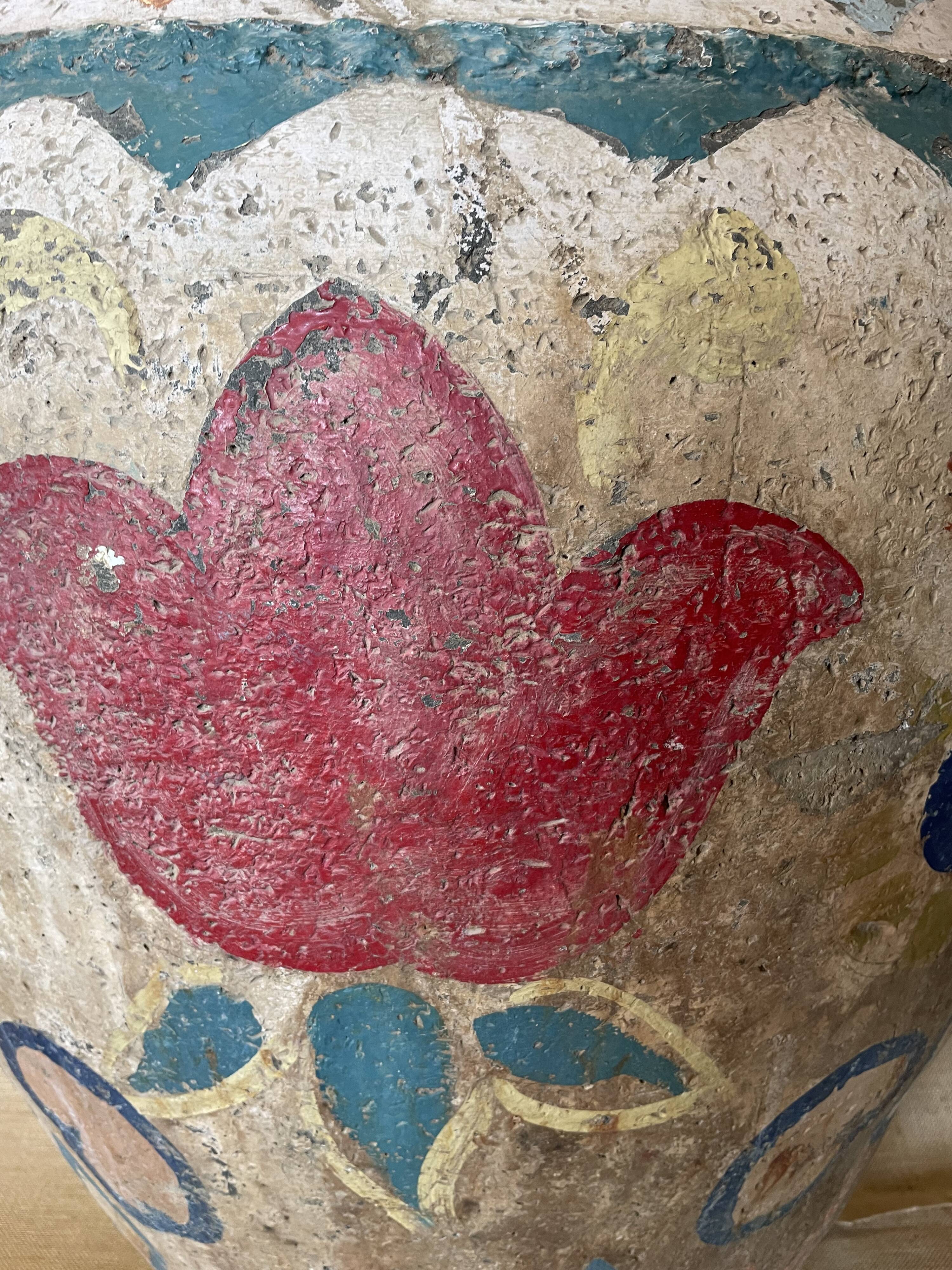 Polychrome decorated terracotta jar