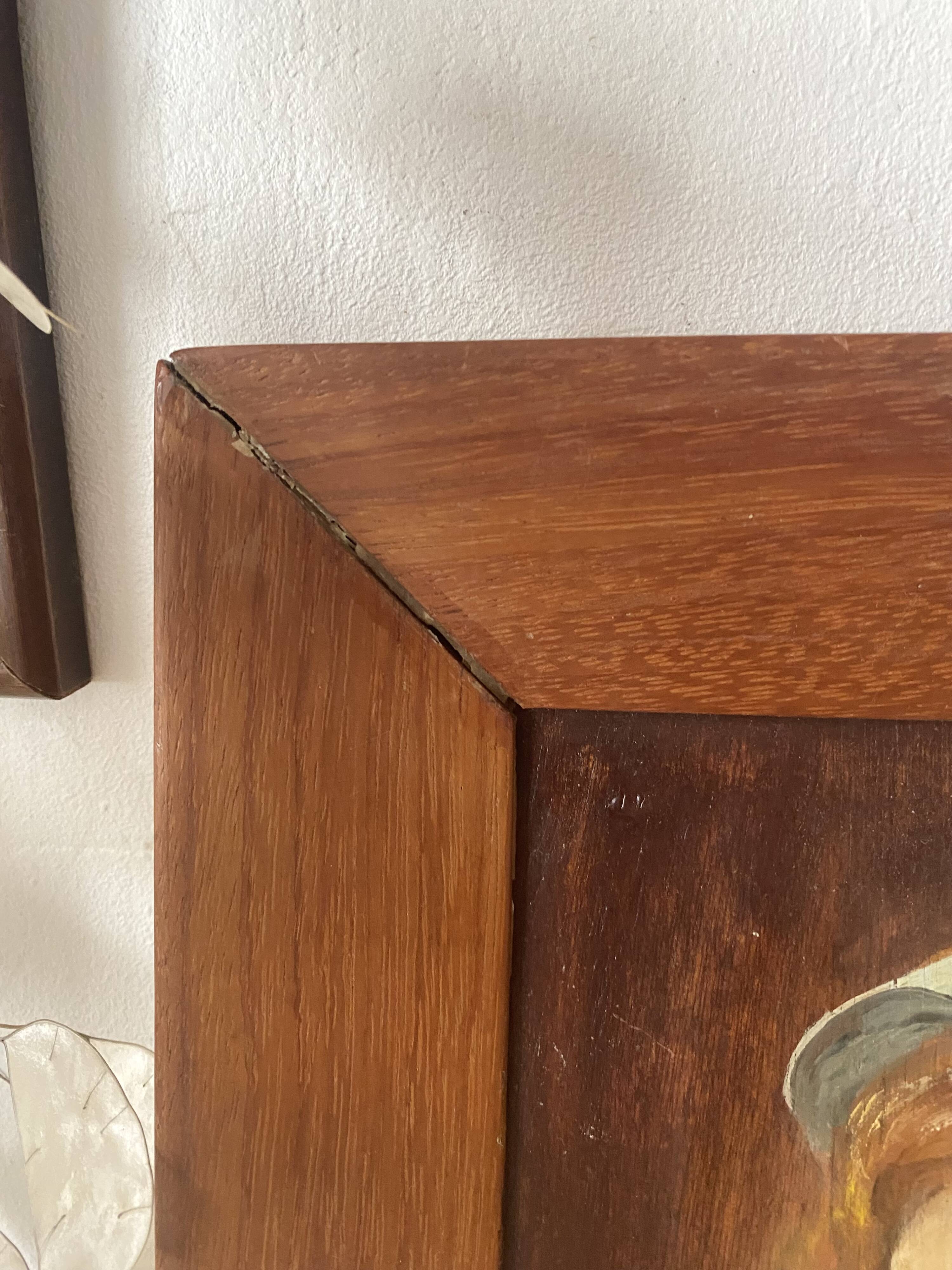 Old oil portrait on wood of a young woman