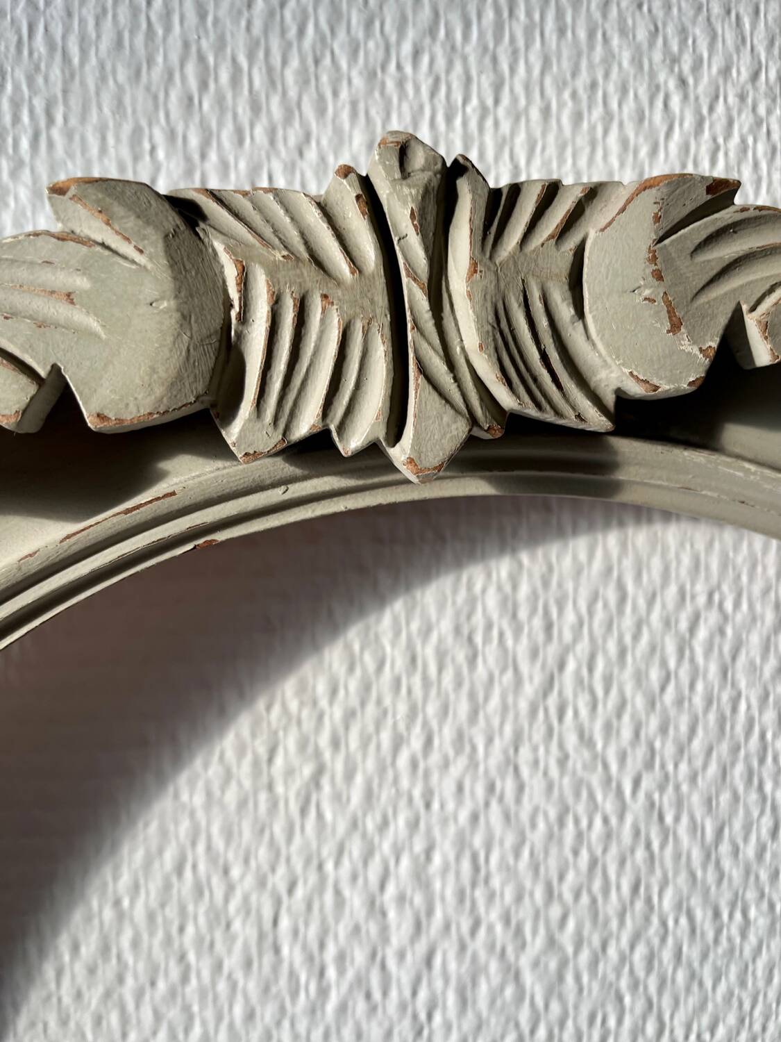 Oval frame in weathered wood