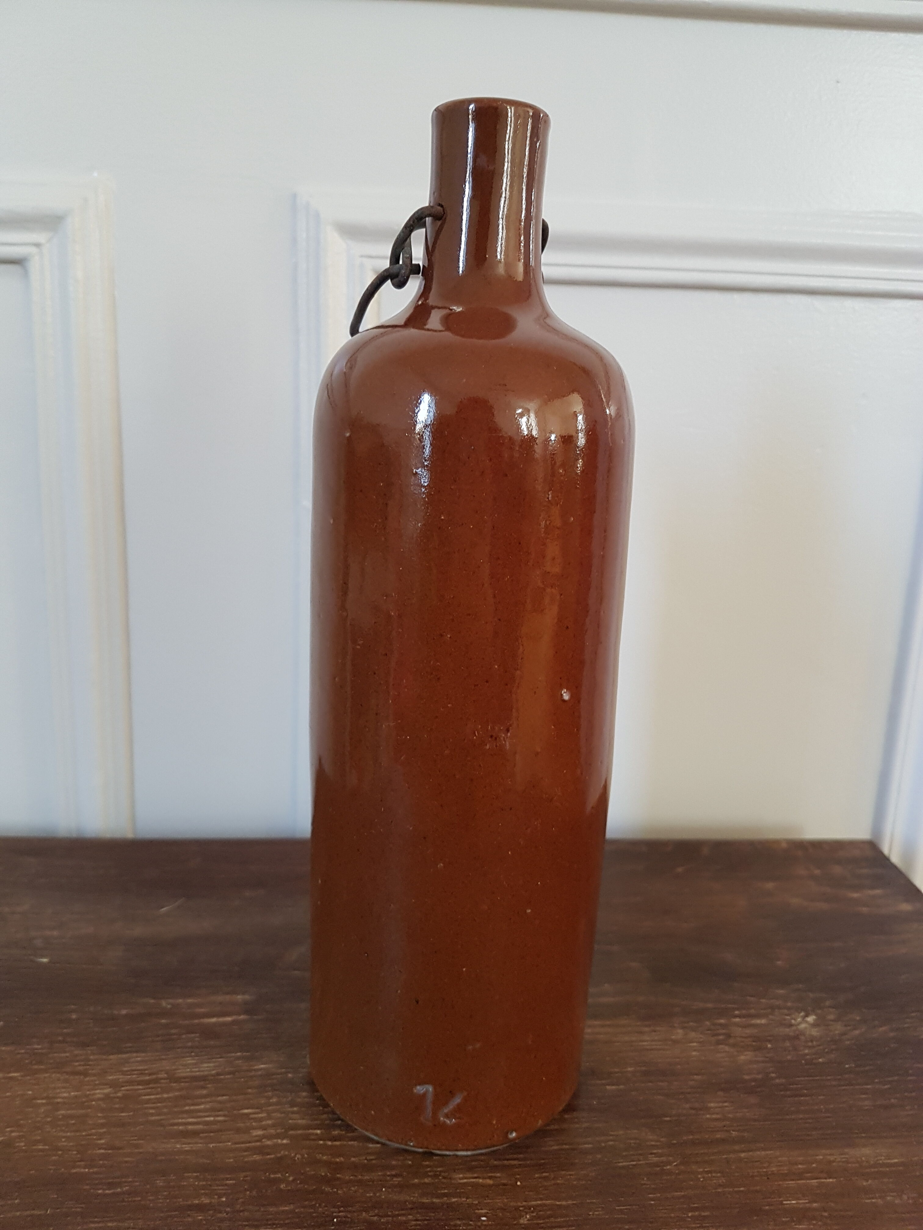 Enamelled stoneware bottle