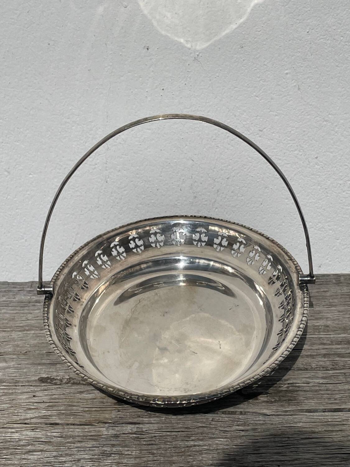 Oval dish with silver-plated metal handle