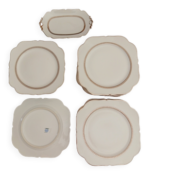 Jean BOYER Limoges FRANCE part of a white porcelain table service.