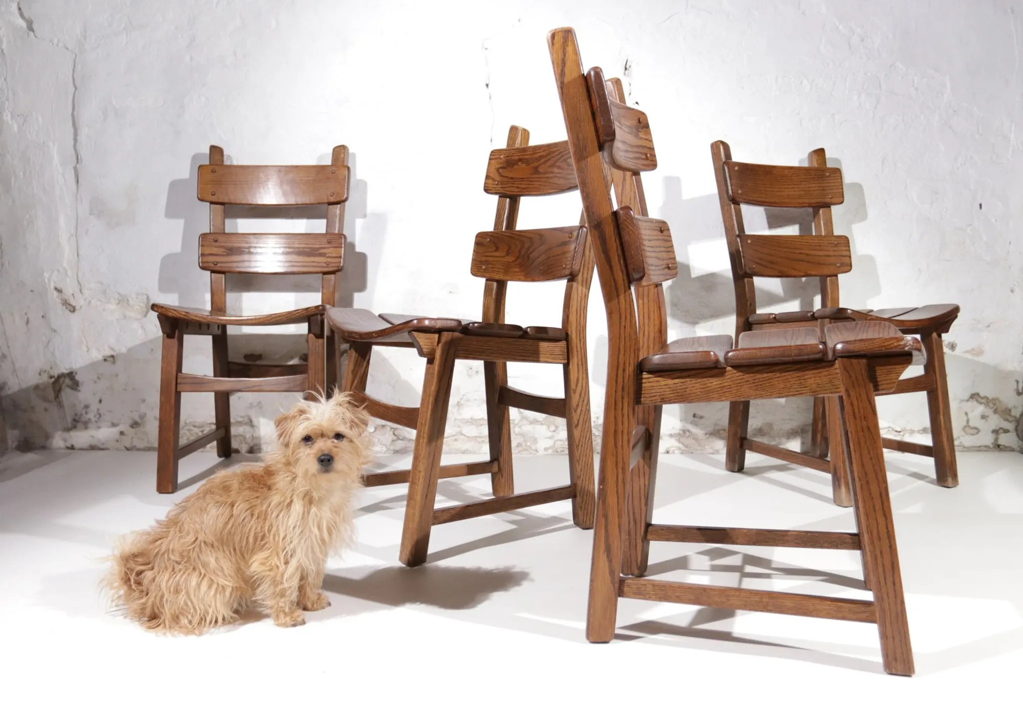 Set of 4 brutalist oak ladderback dining chairs – Netherlands, 1970s