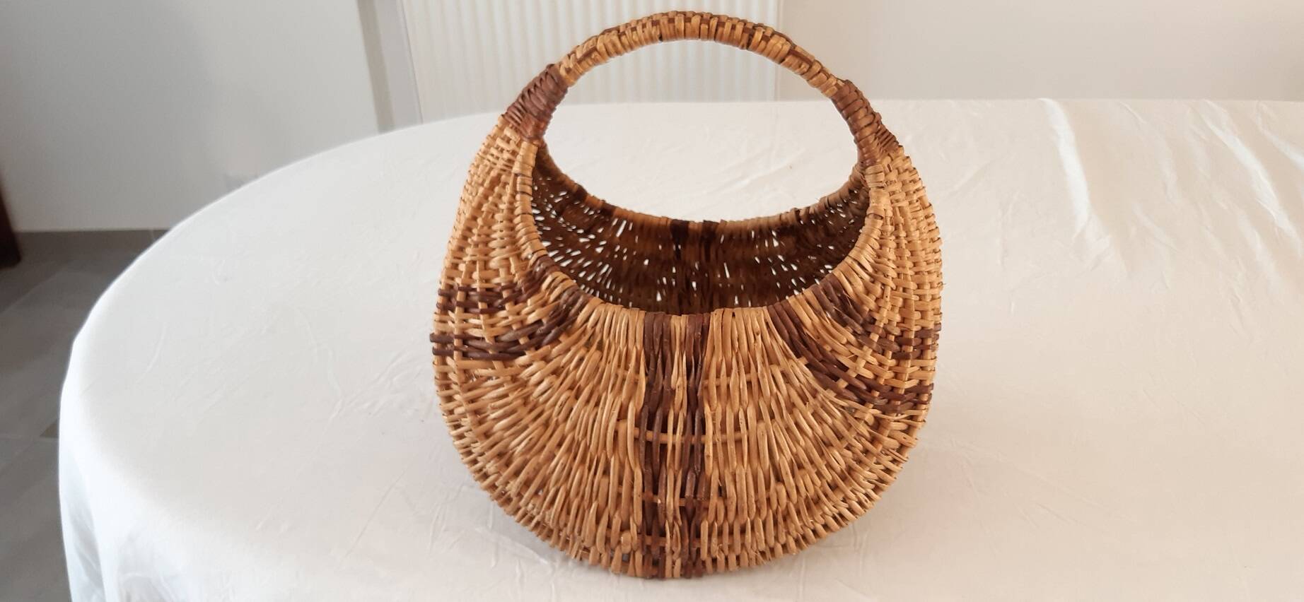 Old banana basket with wicker two colors