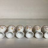 Six hand-decorated and signed egg cups