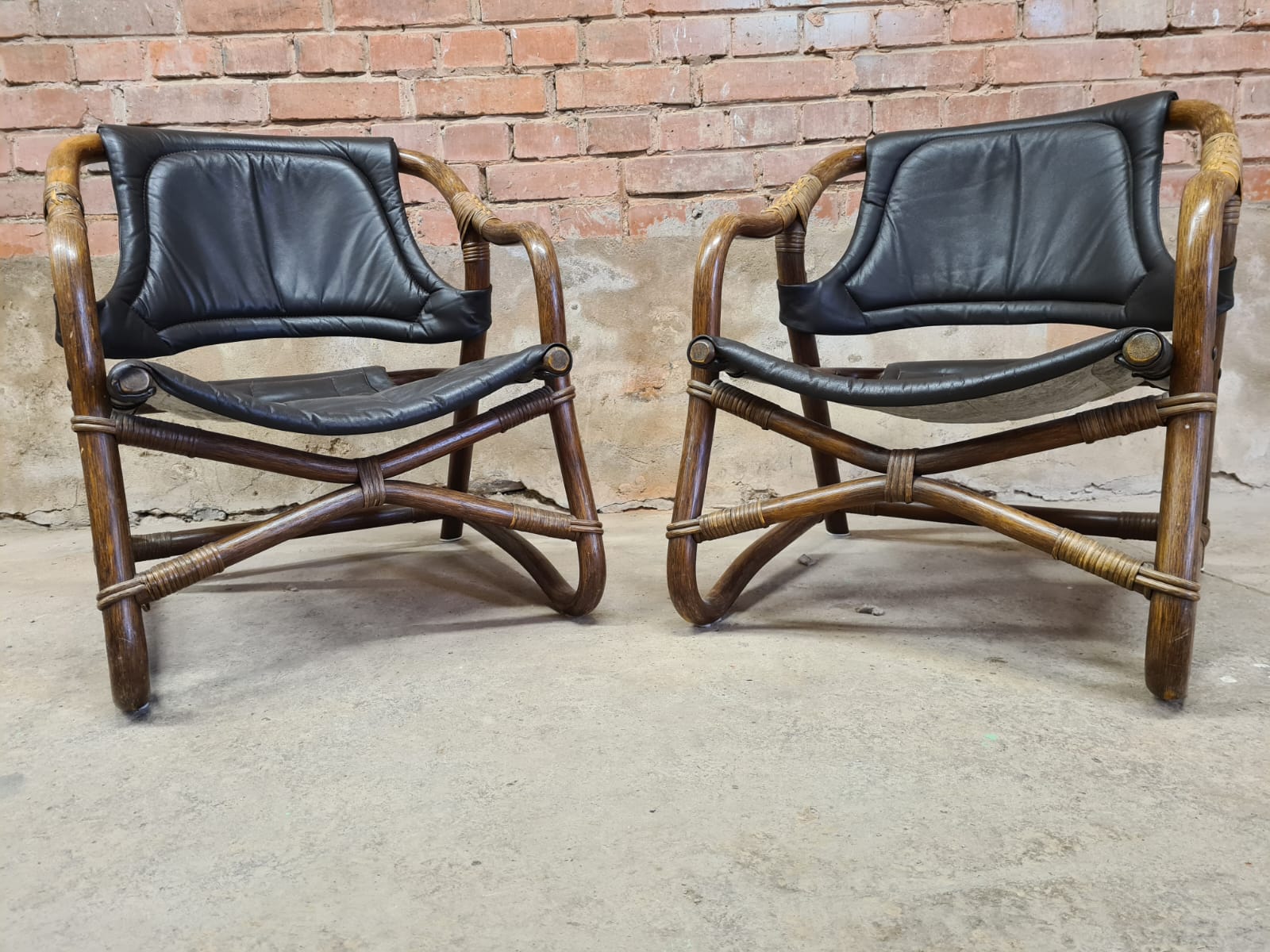 Pair of vintage skaï bamboo armchairs