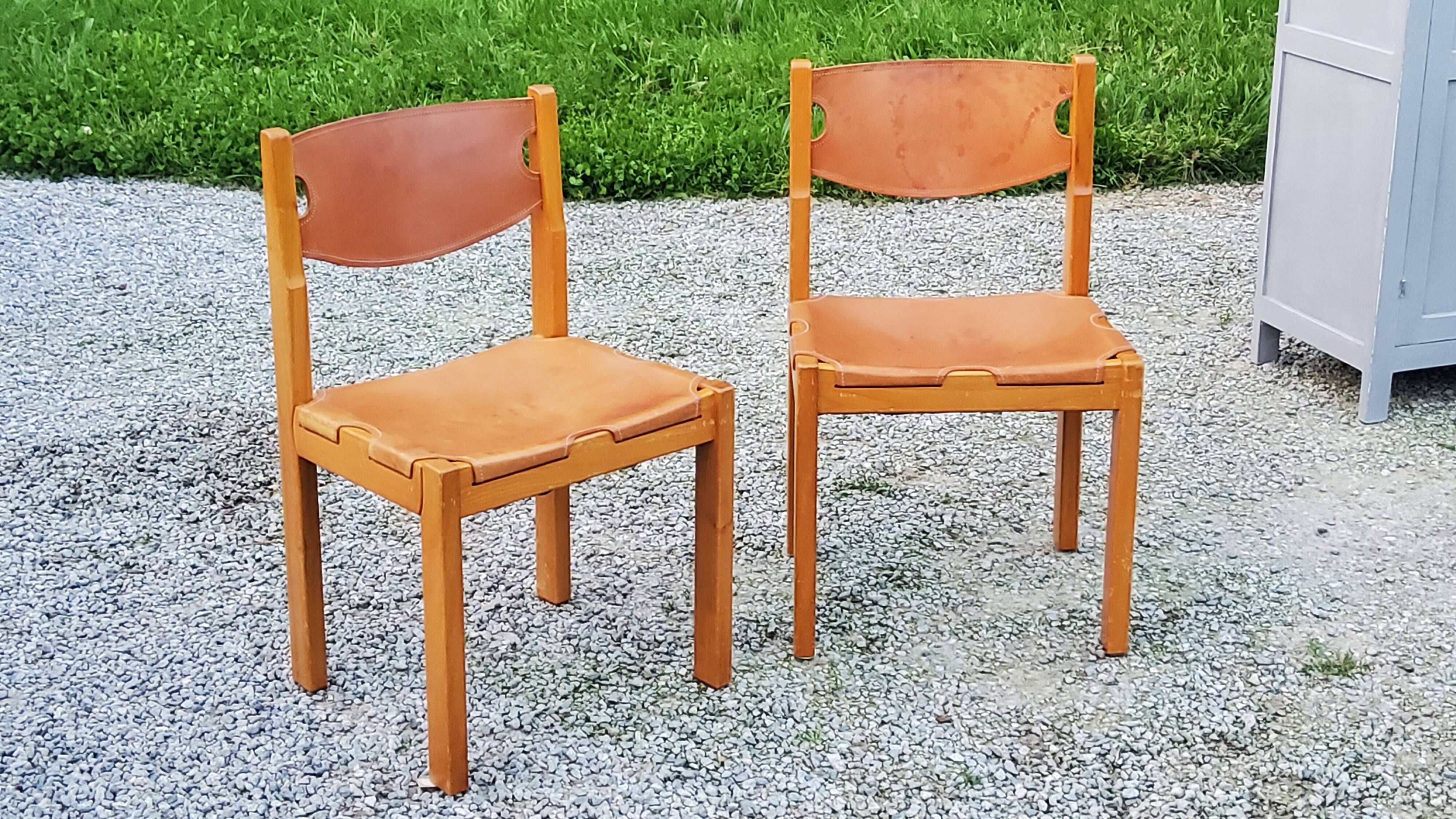 Pair of brutalist chairs in elm and stretched leather with saddle stitching Self publisher