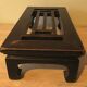 Antique Chinese low table with horse-hoof feet, 1910