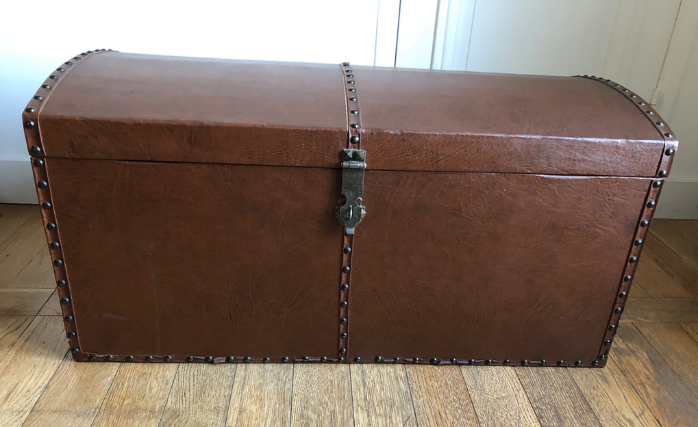 Ancient wooden and faux leather trunk