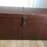 Ancient wooden and faux leather trunk