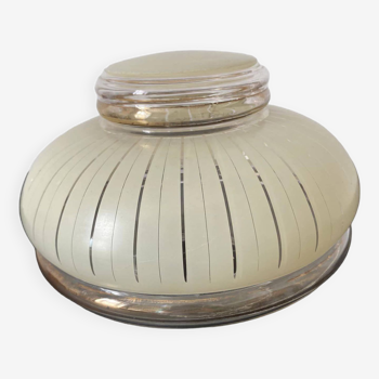 Glass globe with vanilla-colored striped patterns and gold edging