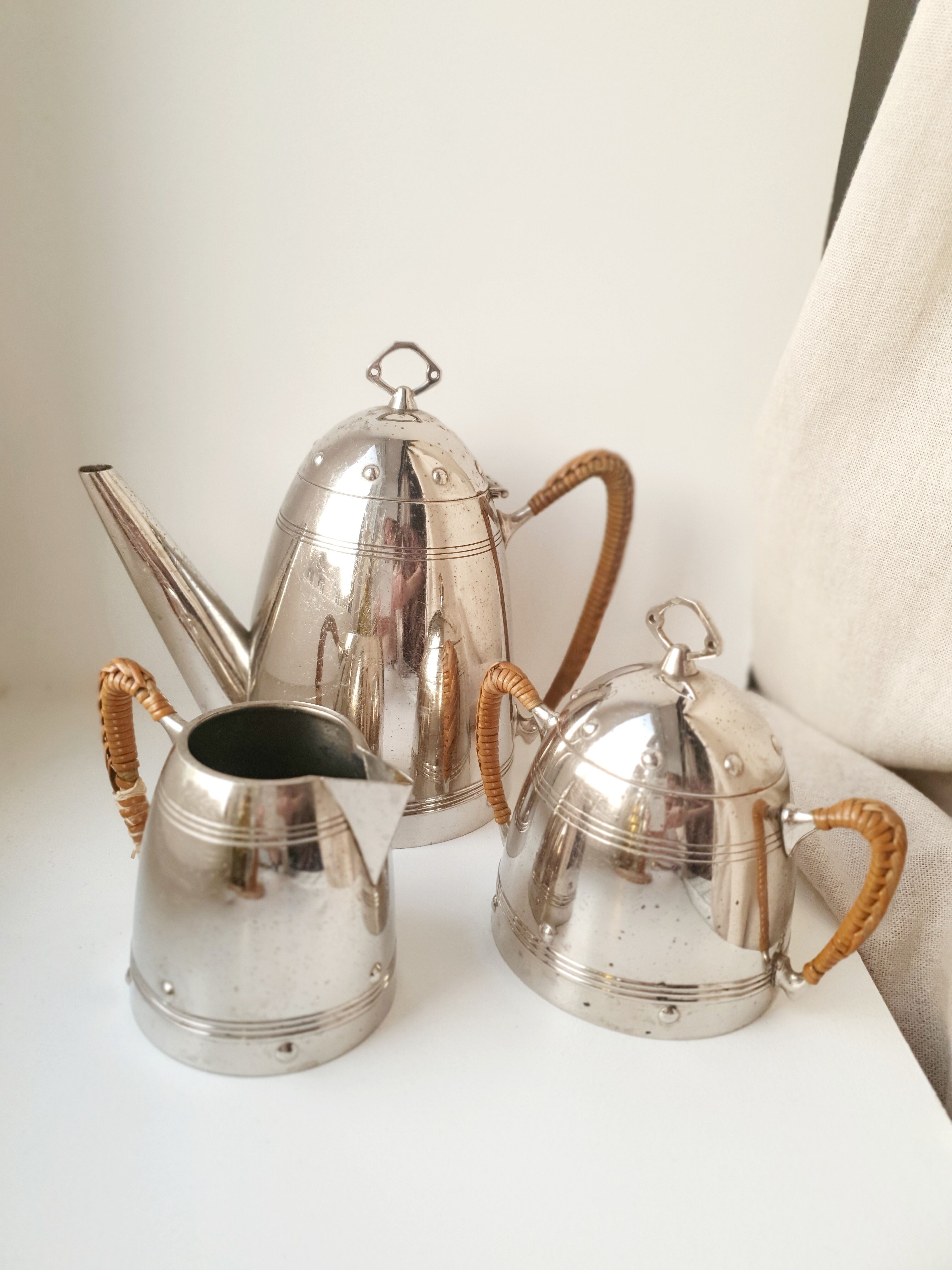 Coffee maker, milk pot and sugar bowl set
