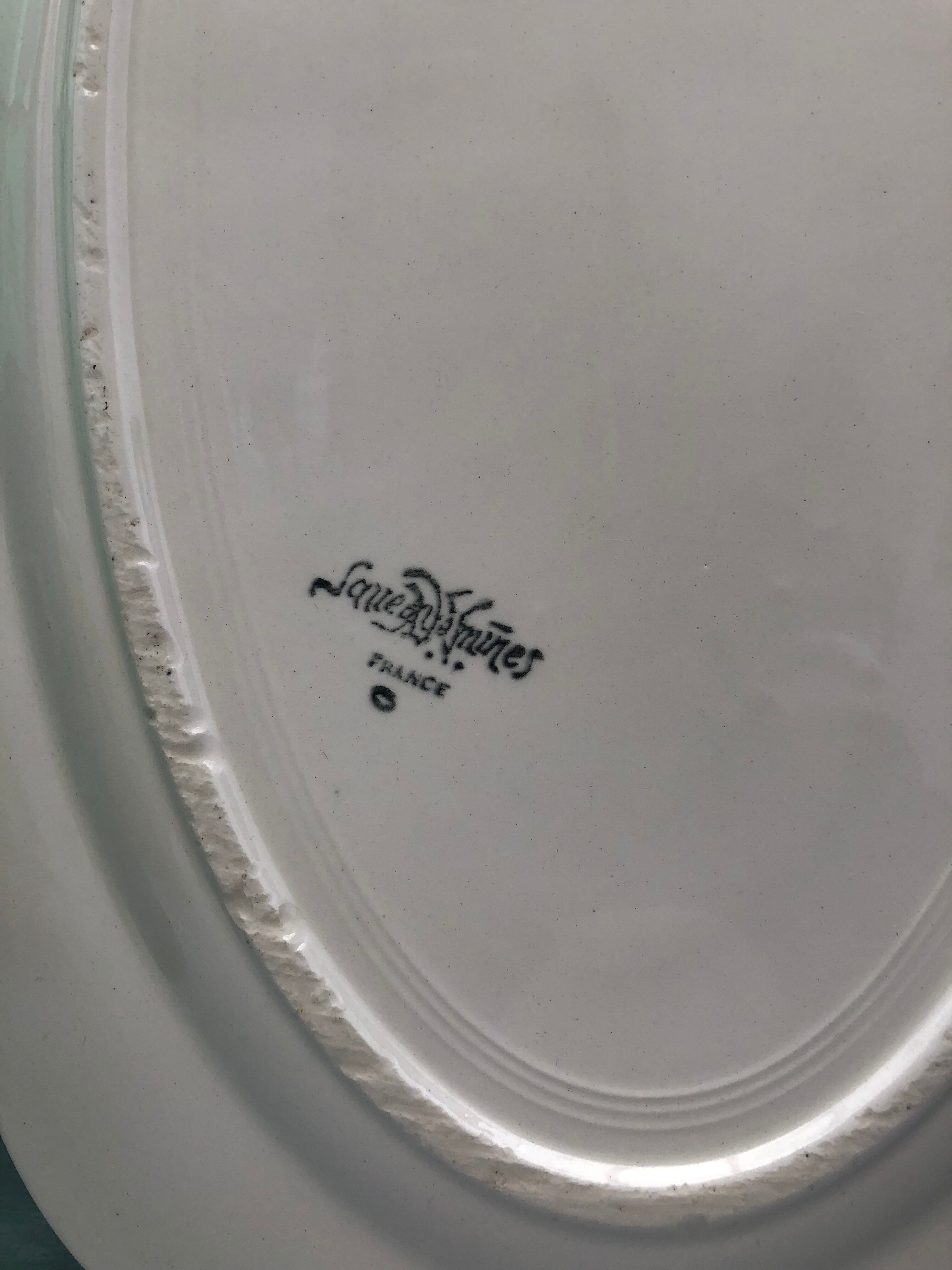 Oval ivory dish with gadroons, signed Sarreguemines France.