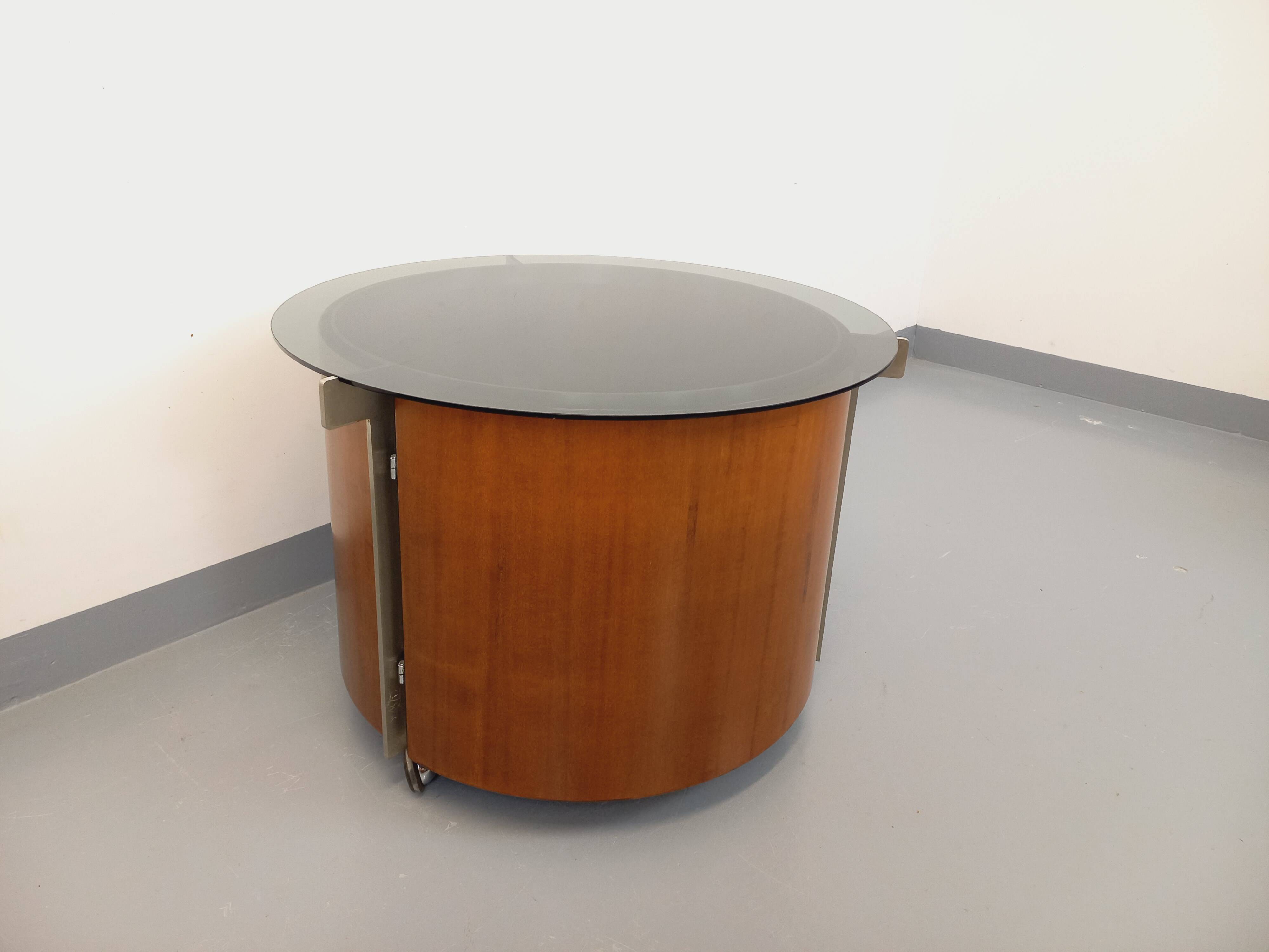 Round Italian teak coffee table swivel bar by Eugenio Gerli for Tecno