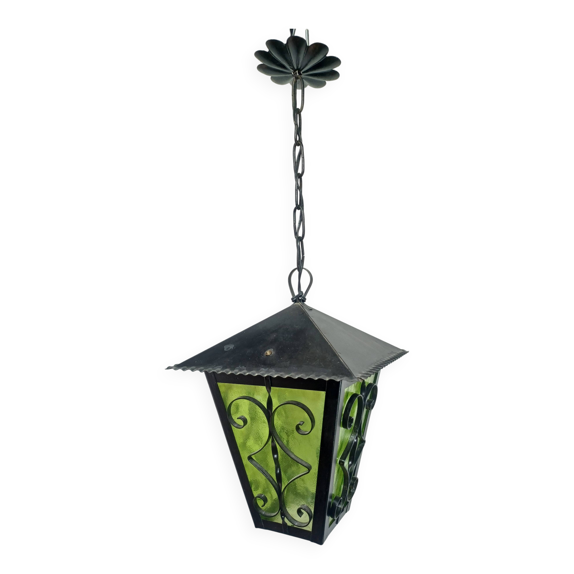 Wrought iron and green glass lantern