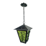 Wrought iron and green glass lantern