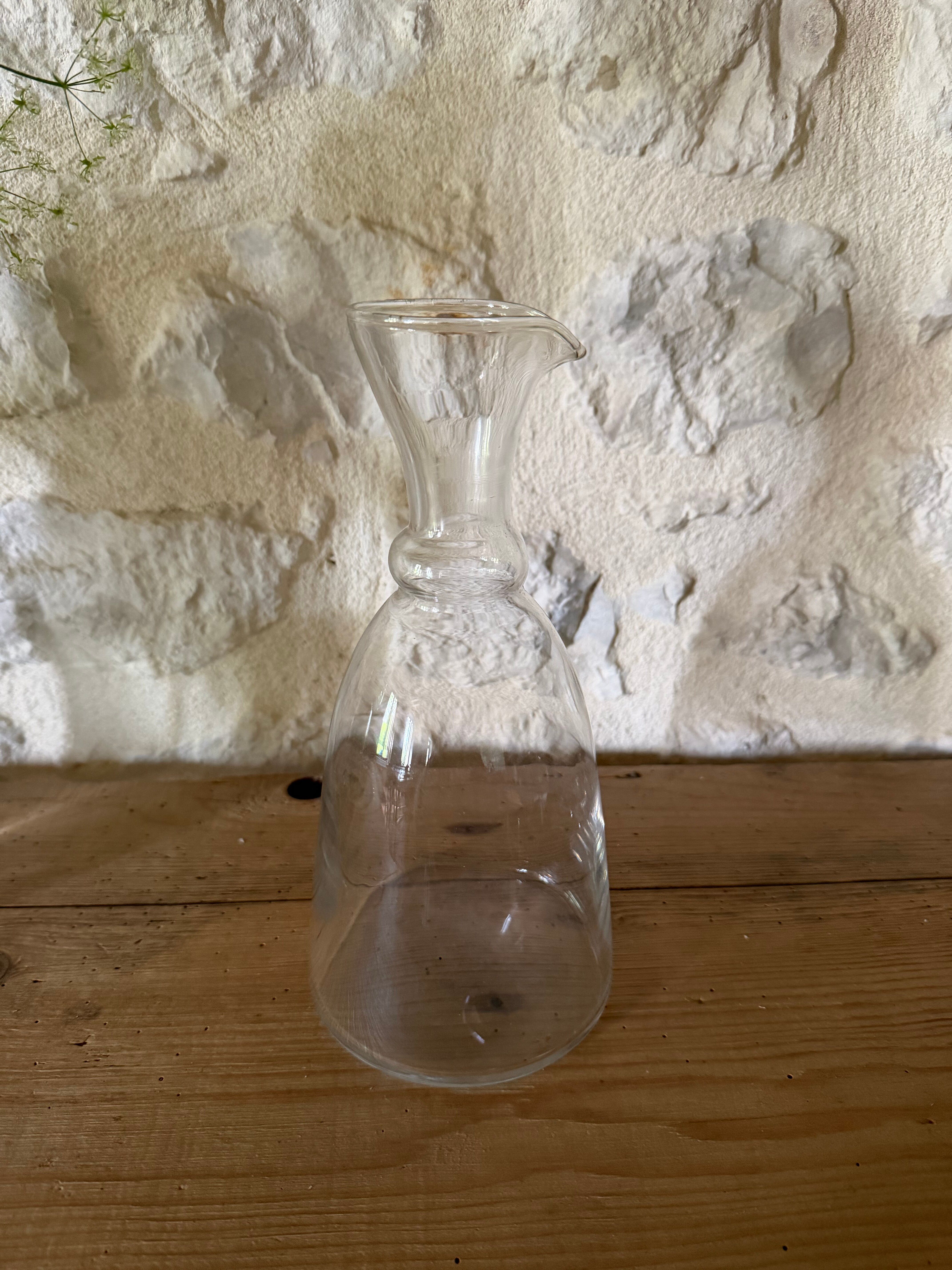 Antique glass pouring jug