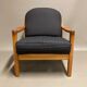 Fauteuil noir 1960 avec son estampille scandinave.