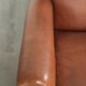 Sturdy vintage sheepskin armchair with a beautiful cognac colour